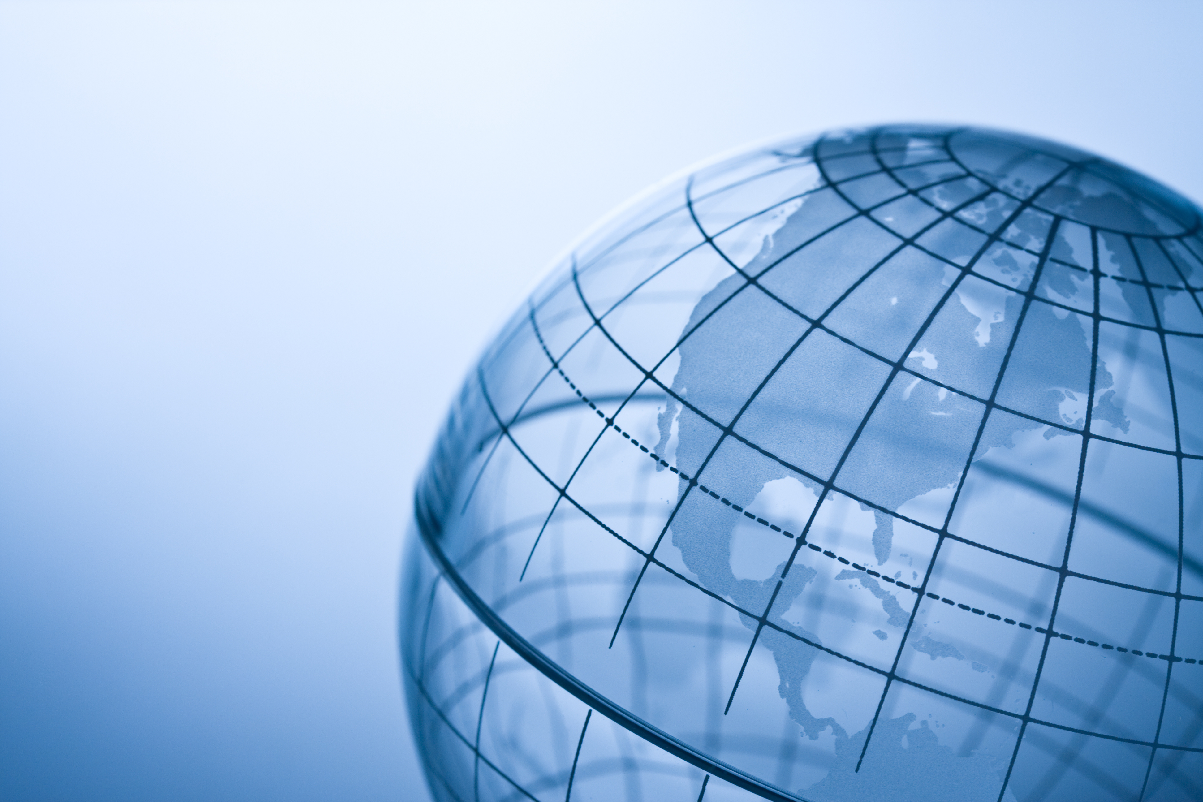 See-through globe with lines of latitude and longitude